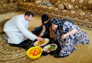 Eating soupy rice Omani-style, with our hands!