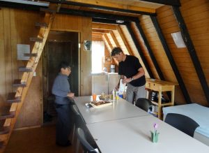 Setting up for dinner in our hut