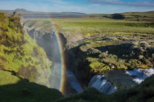 Lovely rainbow at sunset over the Silfurfoss